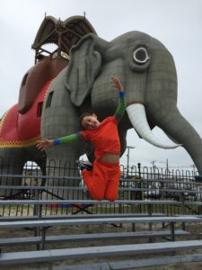 Jumping for joy at Lucy the Elephant near Atlantic City, New Jersey.